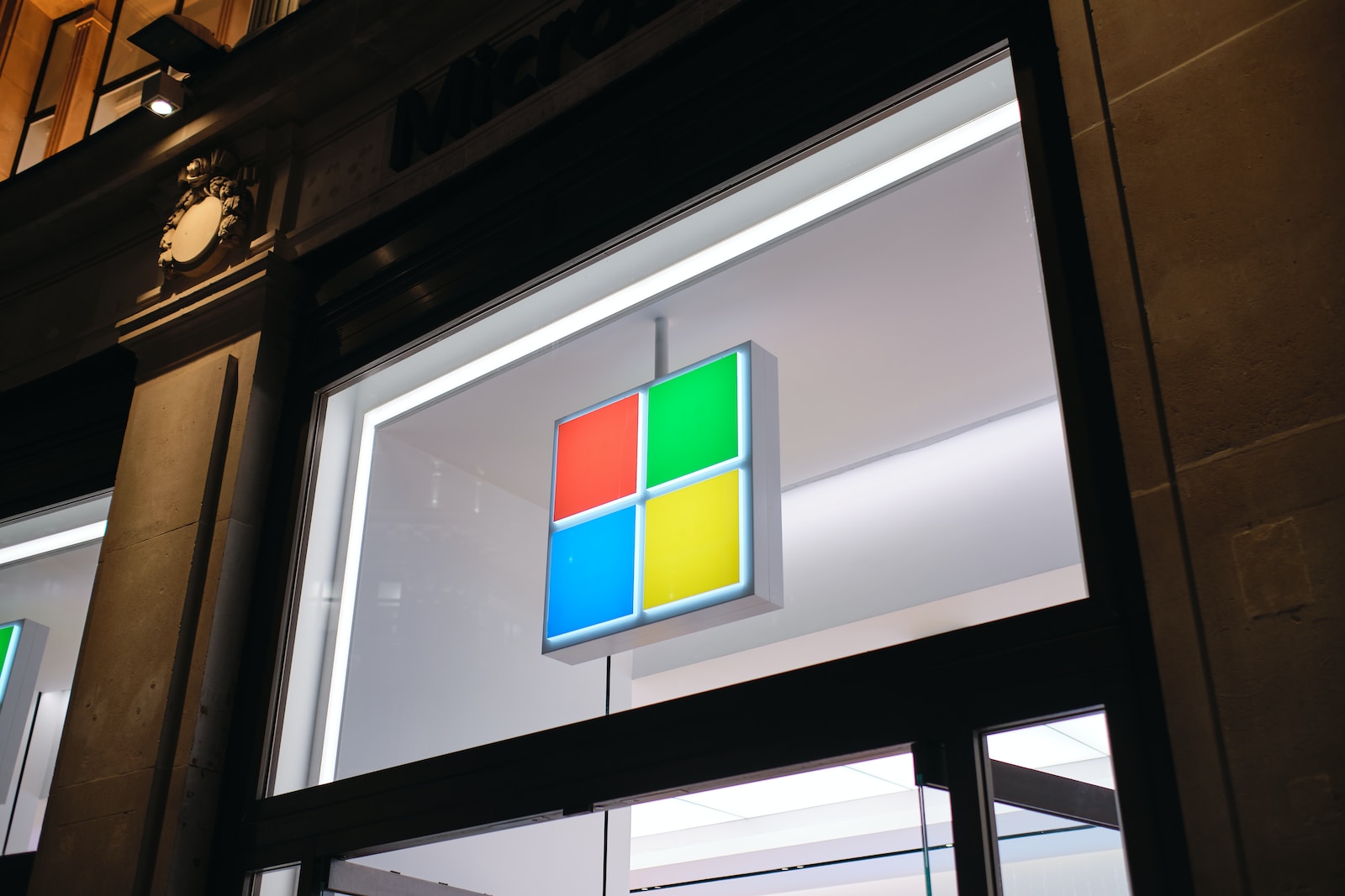 a store front with a logo on it microsoft