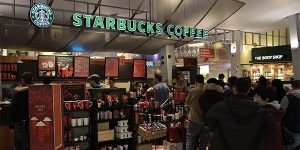 People standing in line at Starbucks