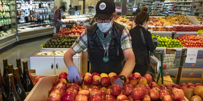Amazon puts new online grocery customers on hold, reconfigures Whole Foods