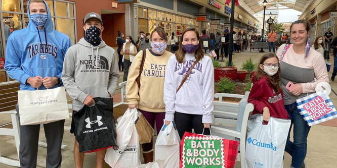 https://retailwire.com/wp-content/uploads/2021/02/masked-family-tanger-outlet-center-666x333-1.jpg