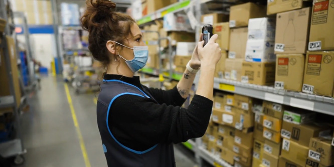Walmart gives associates free phones and a mobile work app