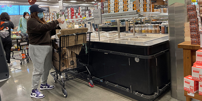 Walmart says Amazon’s grocery delivery fee will put a ‘Whole’ in customers’ wallets