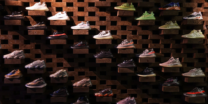 Wall of Yeezy shoes on display