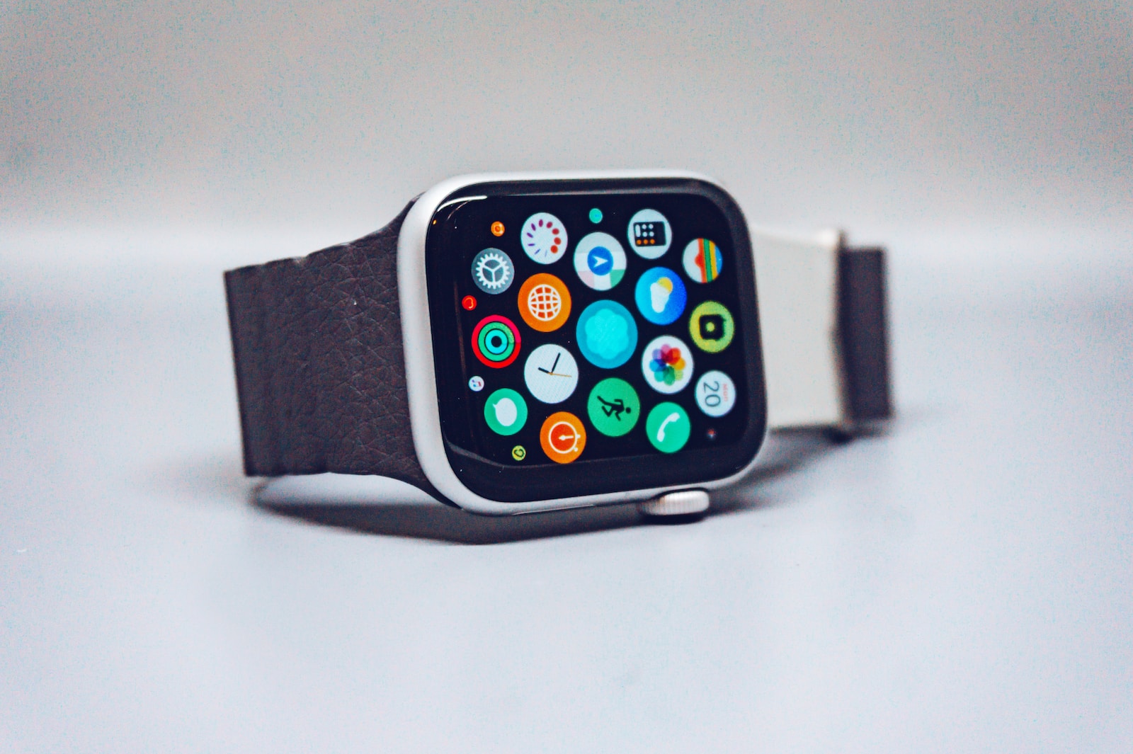black apple smartwatch with black strap