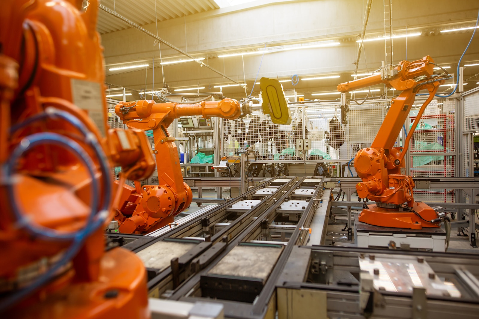 a factory filled with lots of orange machines uaw proxy