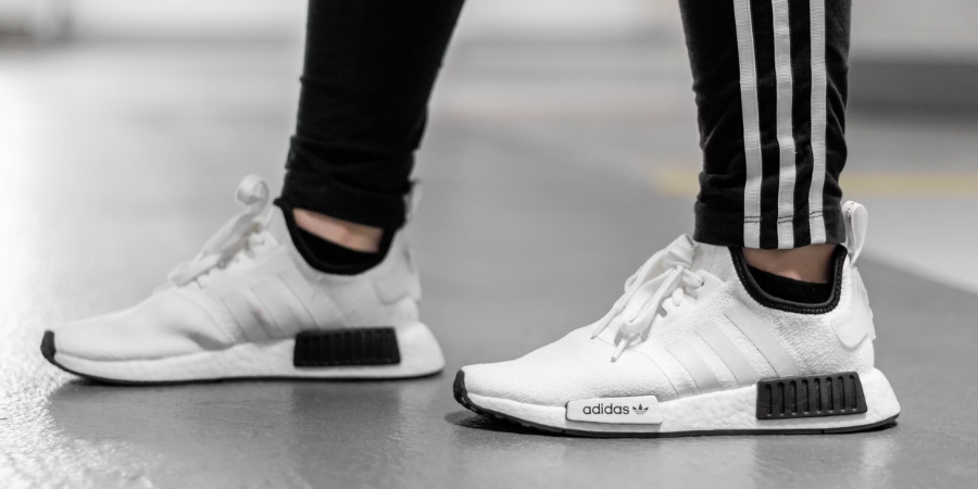 Close-up of white Adidas sneakers