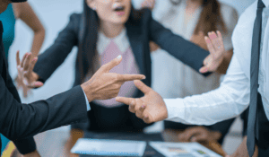 Woman stopping argument at work