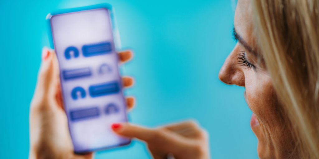 Image of a woman using a phone chatbot