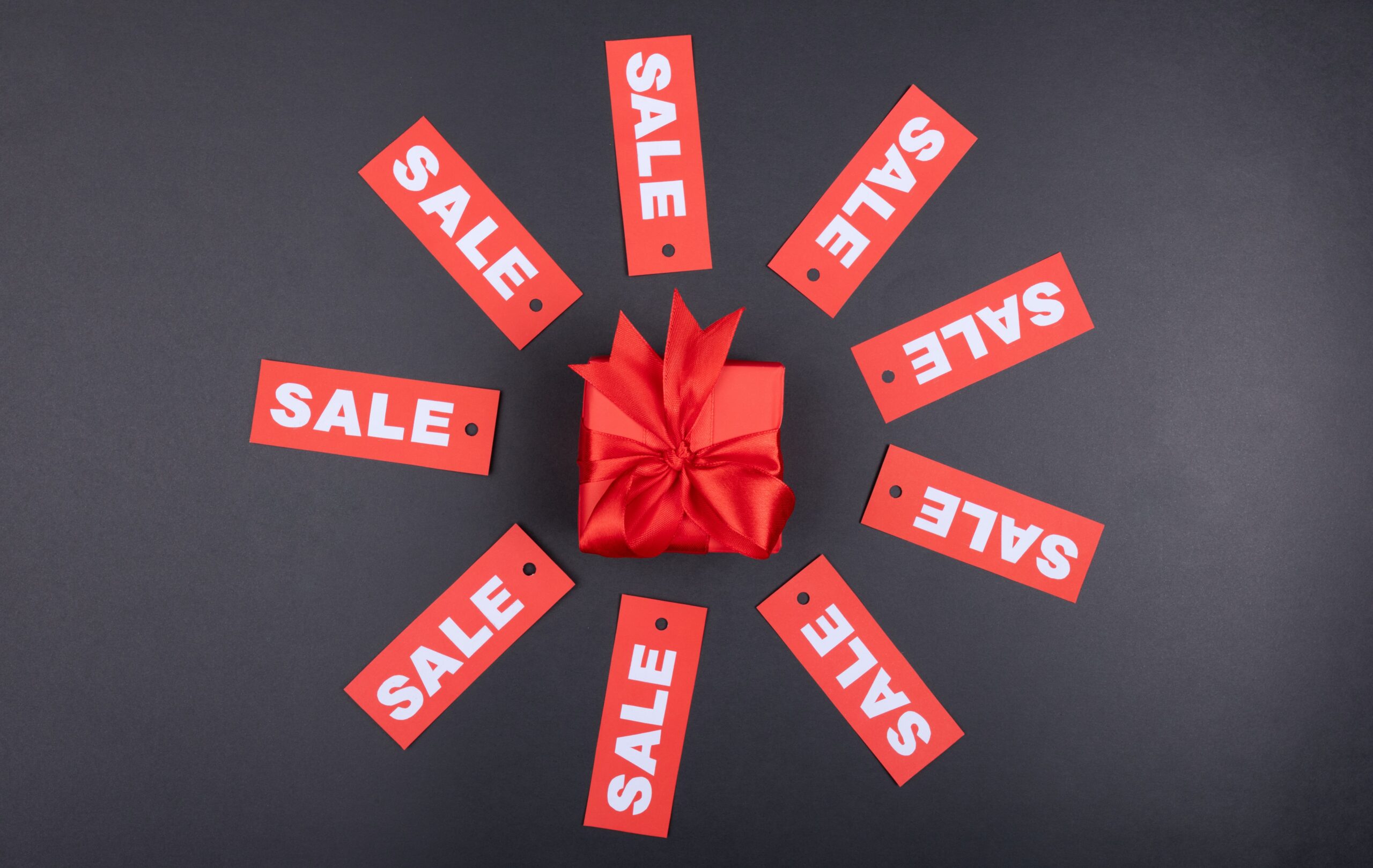 Sale poster with gift in the middle