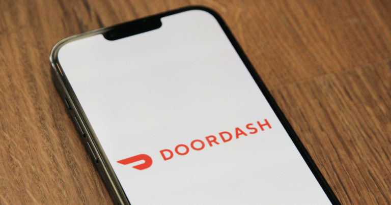 Phone with a "DoorDash" logo on it