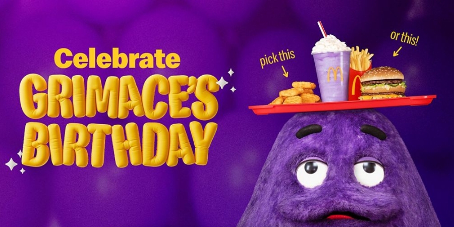 Grimace with a tray of food McDonald's food on his head