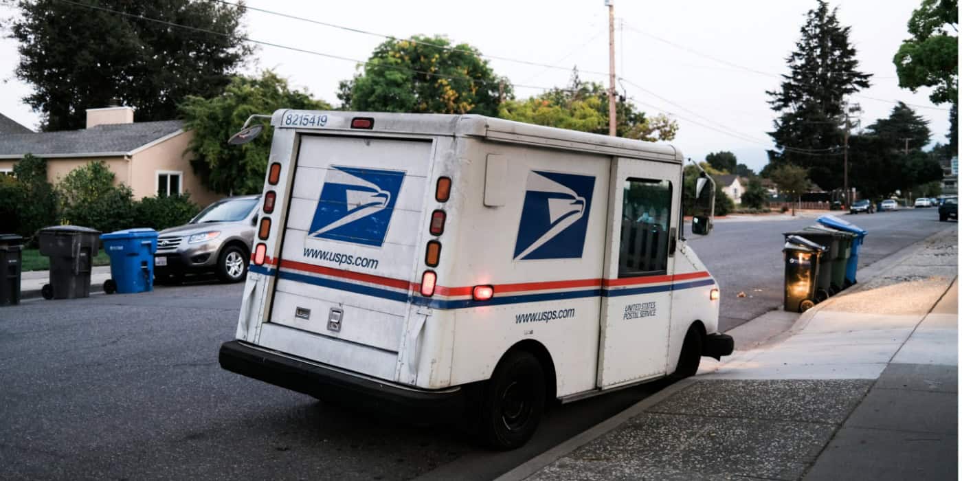 A USPS truck making deliveries