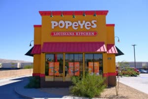 Popeyes Louisiana Kitchen restaurant facade exterior in USA