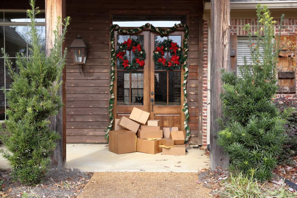 Boxes on front porch during holiday shopping season, porch piracy insurance