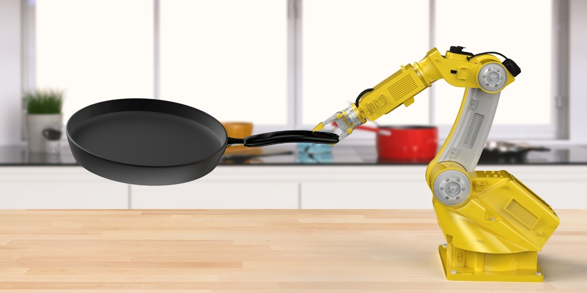 Robot holding a frying pan