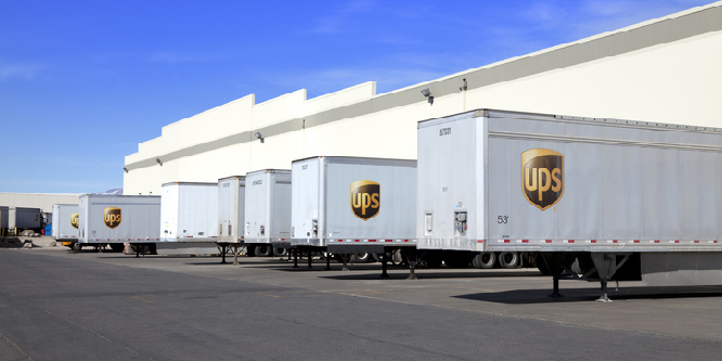 UPS Semi Trailers Lined Up at Warehouse