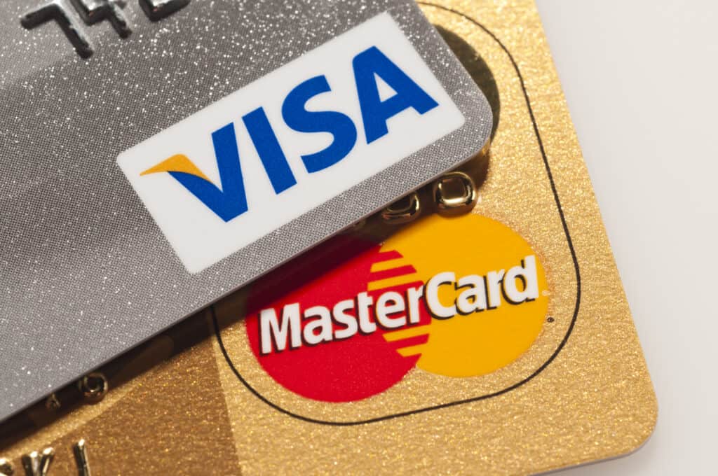 Visa and Mastercard logos, AI agents