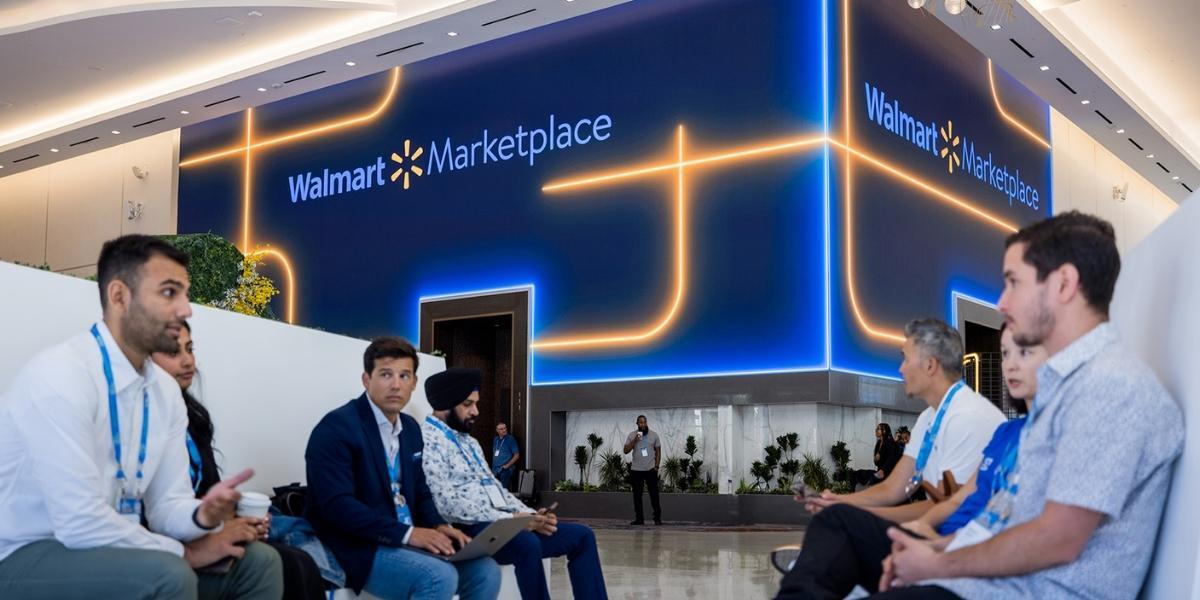 Photo of people sitting near a Walmart Marketplace sign