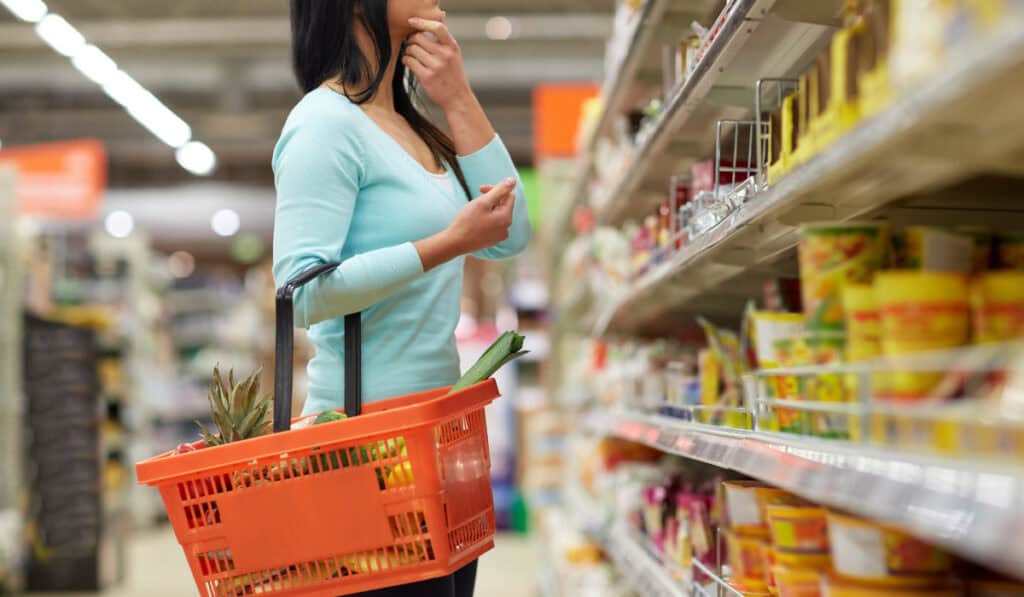 Retail concept Woman shopping at grocery store