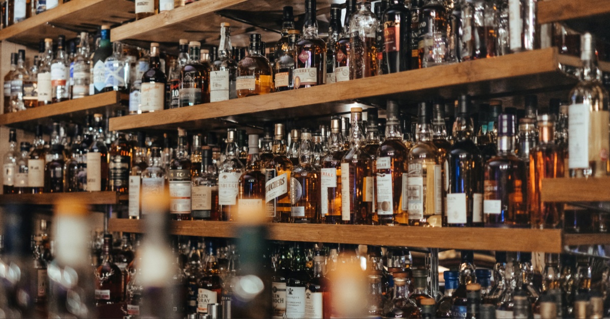 Bottles behind a bar.