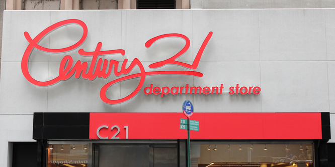 photo of a Century 21 storefront, closeup on logo