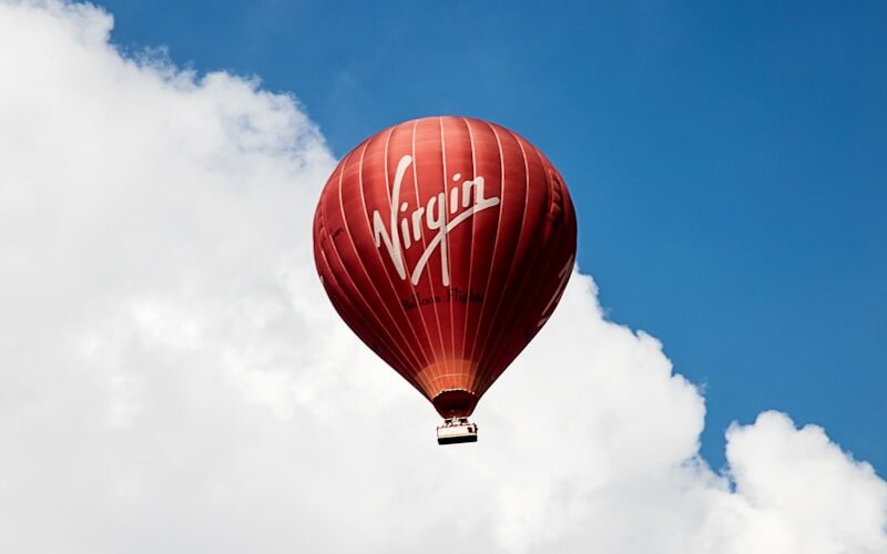 time lapse photography of flying Virgin galactic hot air balloon