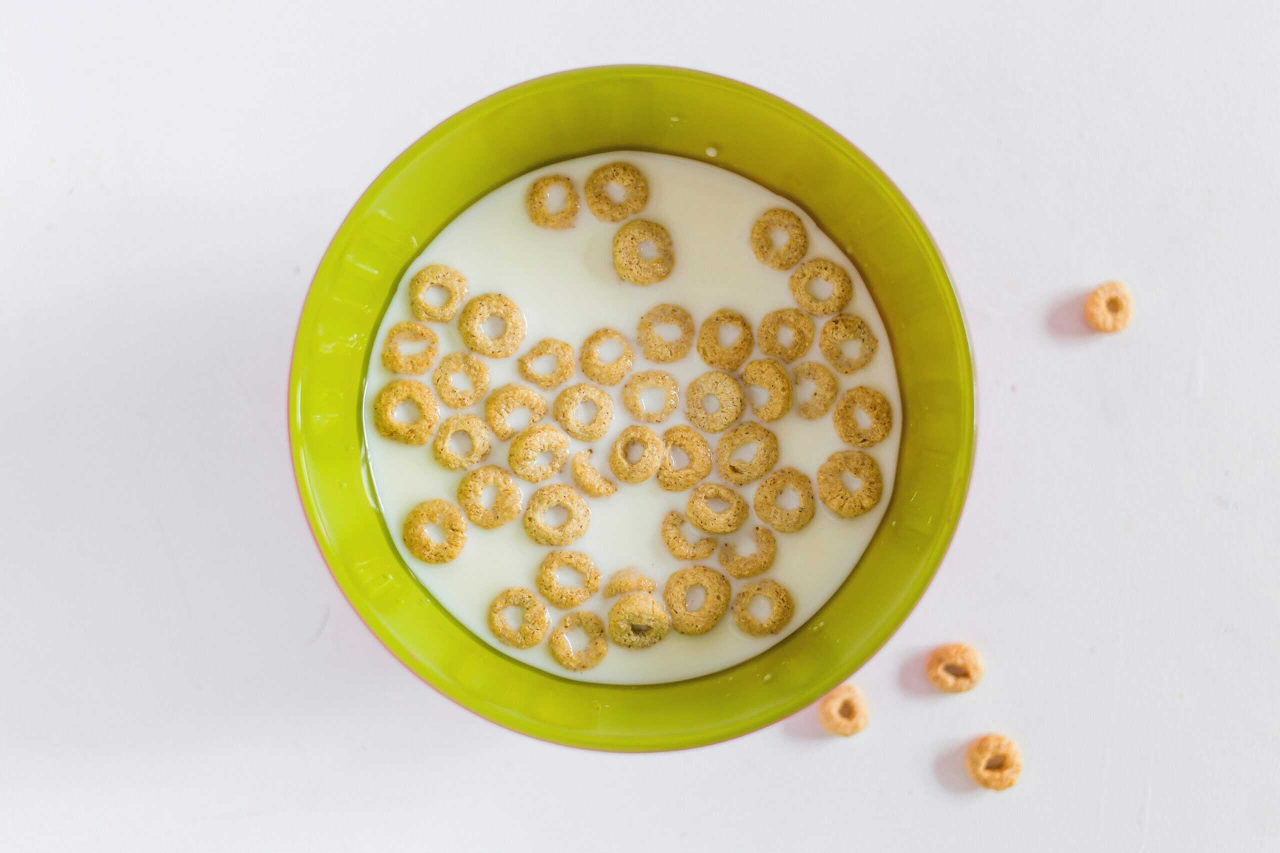 cheerios cereal in milk and bowl