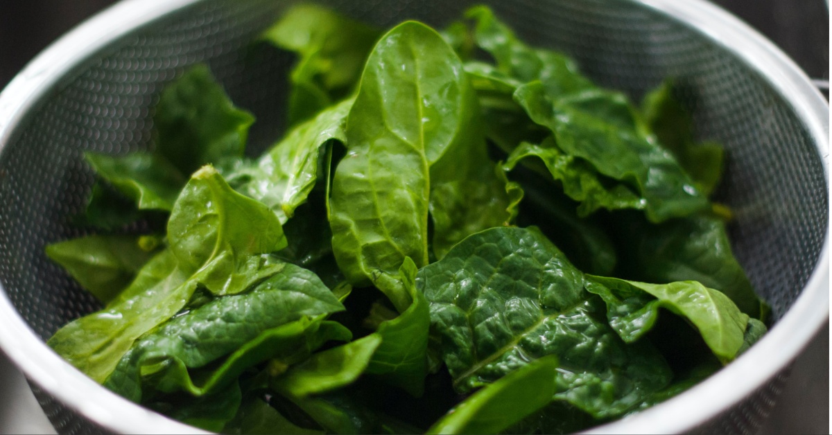 Bowl of fresh spinach.