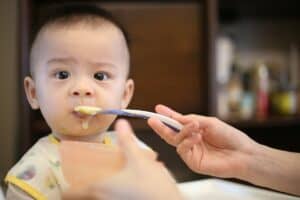 baby eating food from spoon, FDA guidance