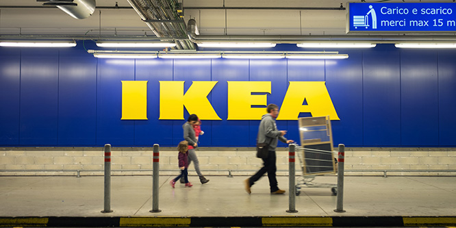 Family Walking At Ikea Store After Shopping