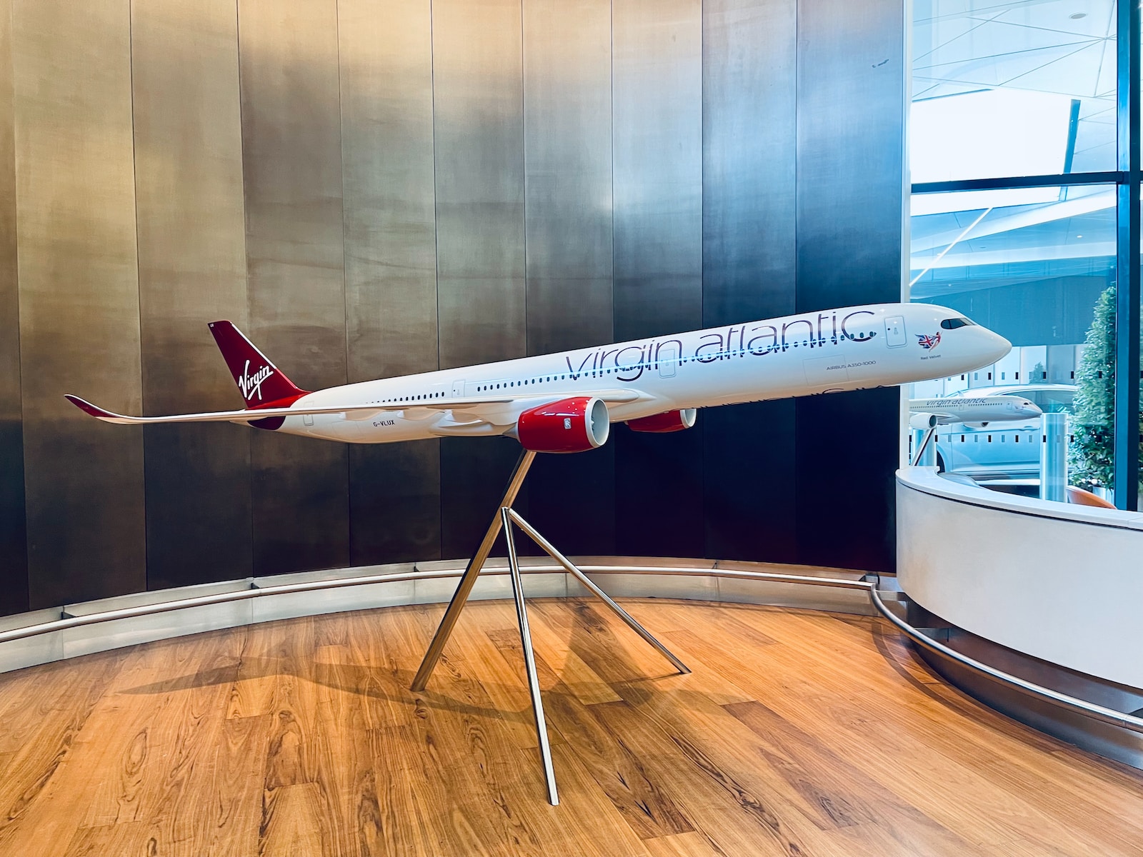 a model of a virgin atlantic airplane on a stand