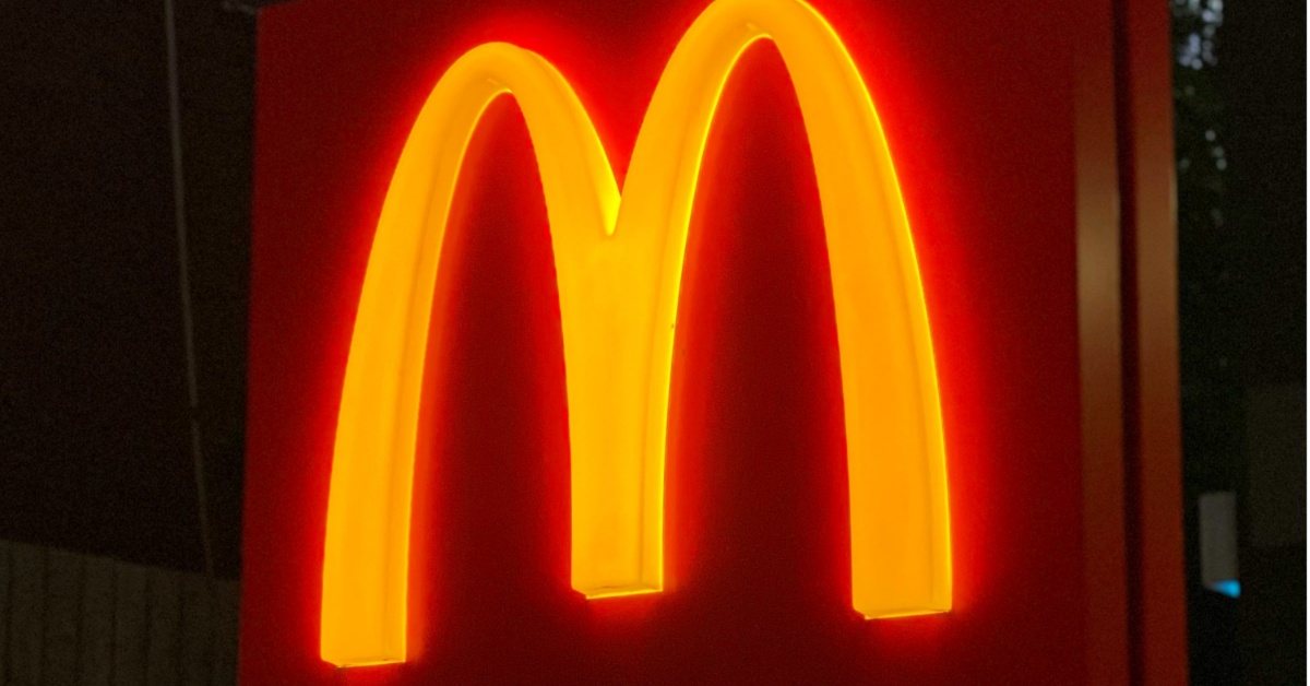 The McDonald's logo atop a restaurant at night