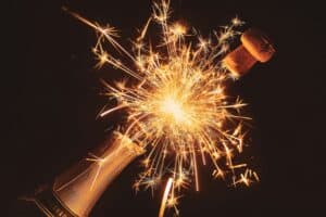 a sparkling cork of champagne for New Year's Day 2025
