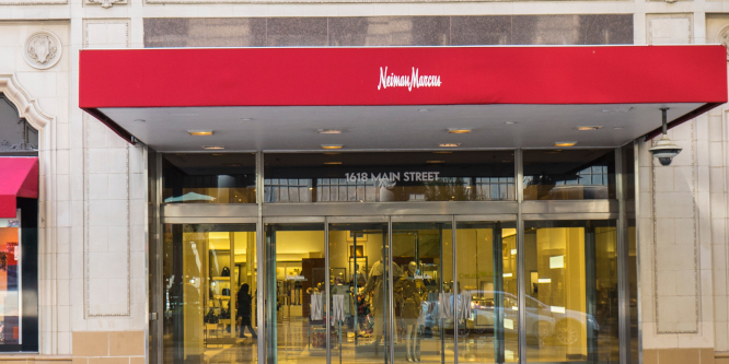 Neiman Marcus storefront with burgundy awning and store logo in white in the center of the awning