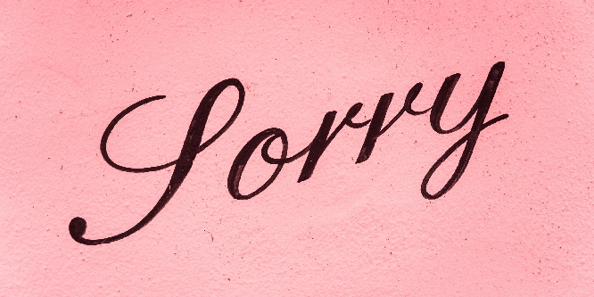 The word "Sorry" on a pink background