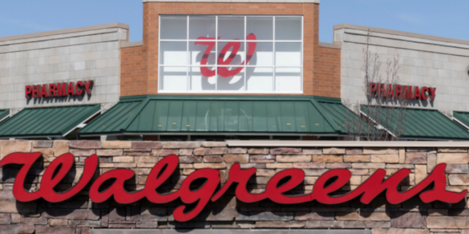 Image of the top portion of a Walgreens storefront, Walgreens logo taking up most of the image width-wise and the store's W icon above it
