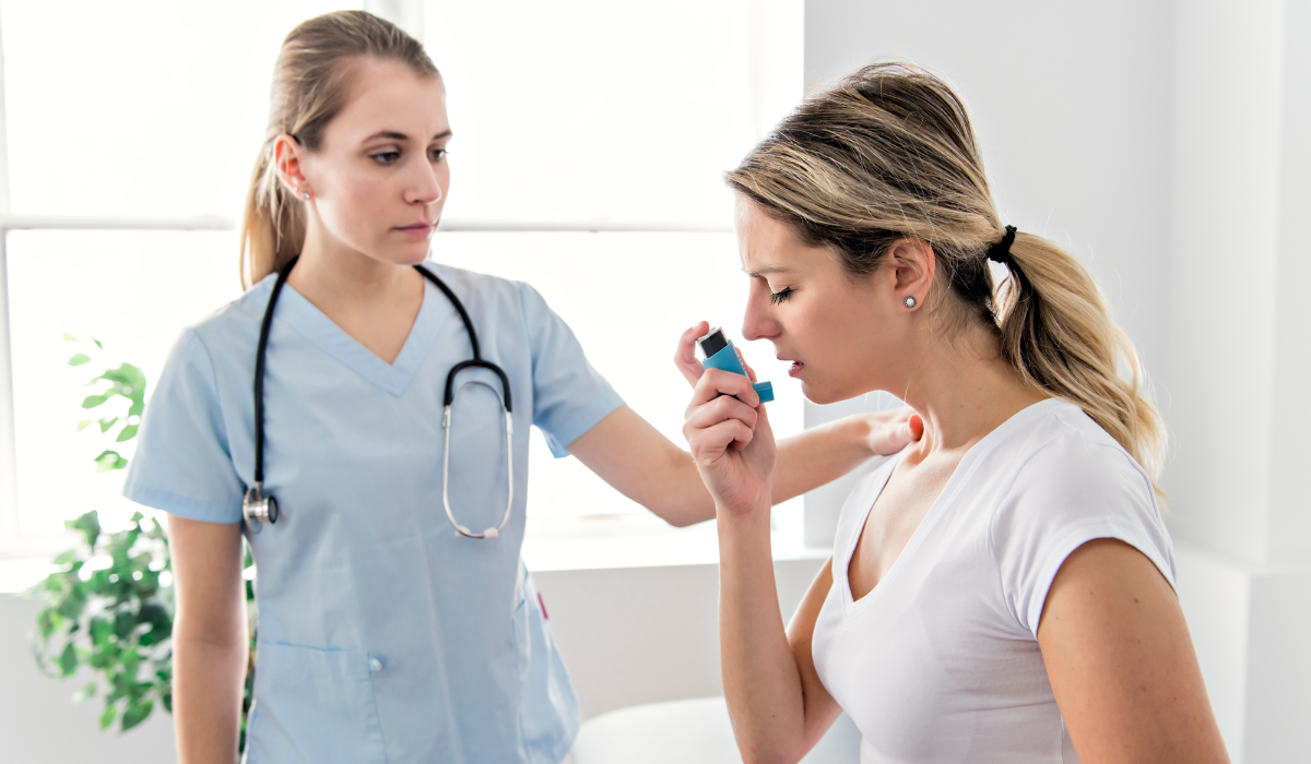 Doctor with person using inhaler